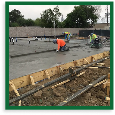 construction men laying cement